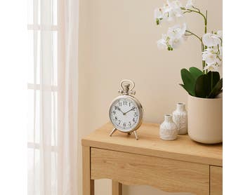 https://s3-ap-southeast-2.amazonaws.com/fusionfactory.commerceconnect.bbnt.production/pim_media/000/174/842/E-Comm_S24-25_Summer_LS_Studio-Decorator_Clocks_Vintage_Style_Round_Clock_Silver_SI.jpg?1730251490