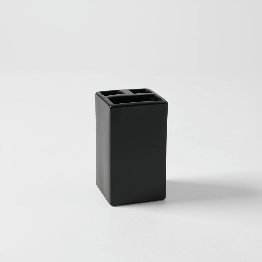 https://s3-ap-southeast-2.amazonaws.com/fusionfactory.commerceconnect.bbnt.production/pim_media/000/104/217/M_F-Dolomite-Toothbrush-Holder-Black-13325701.jpg?1614811362