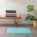 https://s3-ap-southeast-2.amazonaws.com/fusionfactory.commerceconnect.bbnt.production/pim_media/000/174/413/M_F_S24-25_Summer_LS_Studio_Bathmats-Indulgence_BM-Turquoise_SI.jpg?1730097312