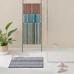 https://s3-ap-southeast-2.amazonaws.com/fusionfactory.commerceconnect.bbnt.production/pim_media/000/174/543/M_F_S24-25_Summer_LS_Studio_Bathmats-Montauk_Stripe_BM_Onyx_SI.jpg?1730153157
