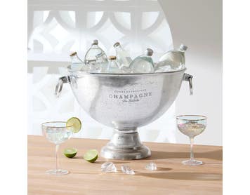 https://s3-ap-southeast-2.amazonaws.com/fusionfactory.commerceconnect.bbnt.production/pim_media/000/174/088/M_F_Summer_S24-25_LS_Studio_Barware-Champagne_Bucket_Round_Pewter.jpg?1729746725