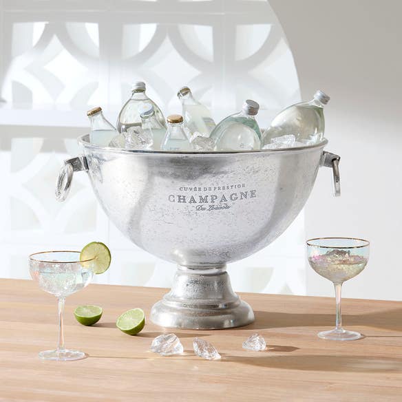 https://s3-ap-southeast-2.amazonaws.com/fusionfactory.commerceconnect.bbnt.production/pim_media/000/174/088/M_F_Summer_S24-25_LS_Studio_Barware-Champagne_Bucket_Round_Pewter.jpg?1729746725