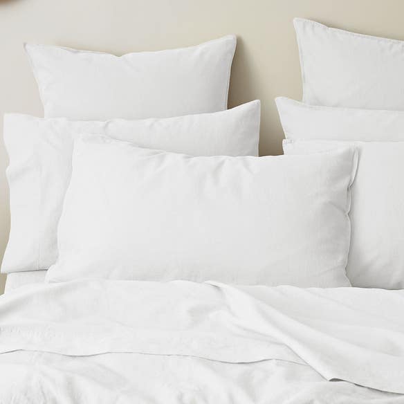 https://s3-ap-southeast-2.amazonaws.com/fusionfactory.commerceconnect.bbnt.production/pim_media/000/157/998/M_F_W24_Bedlinen_BOP_Olsen_White_QQC_Pillow_SI.jpg?1704244431
