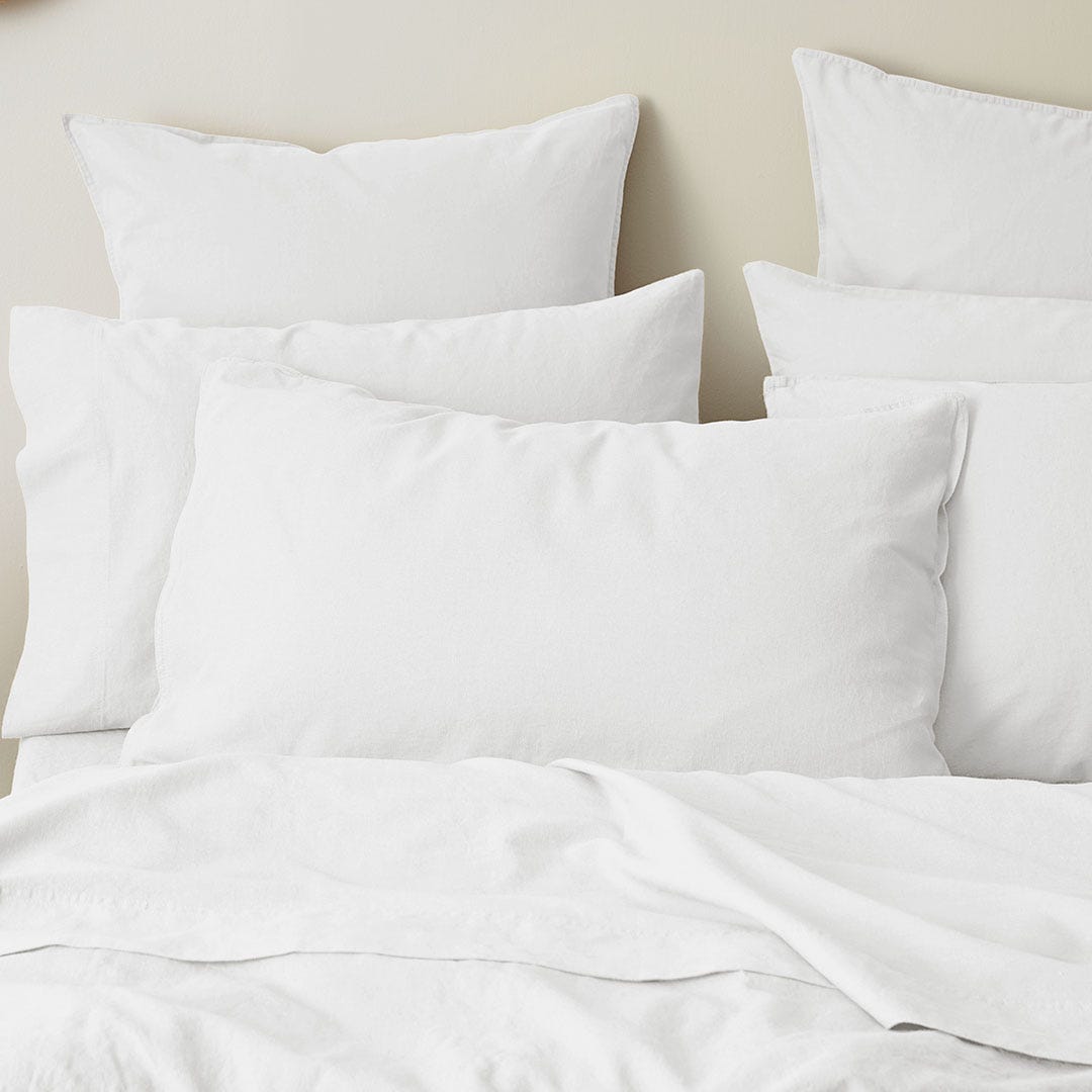 https://s3-ap-southeast-2.amazonaws.com/fusionfactory.commerceconnect.bbnt.production/pim_media/000/157/981/M_F_W24_Bedlinen_BOP_Olsen_White_QQC_Pillow_SI.jpg?1704243982