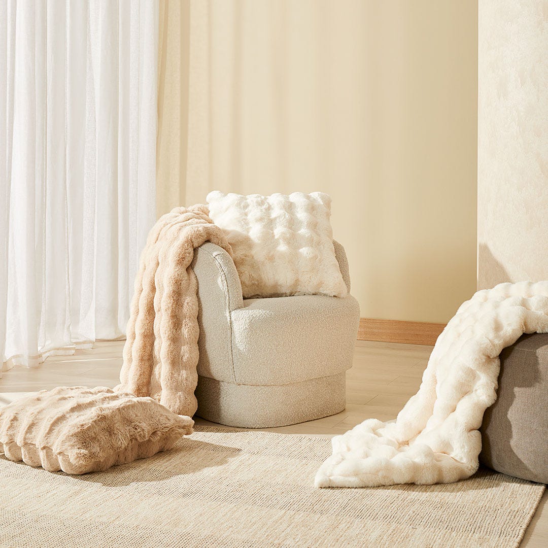 https://s3-ap-southeast-2.amazonaws.com/fusionfactory.commerceconnect.bbnt.production/pim_media/000/161/320/M_F_W24_LS_Throw_Cushion_Blanket_Faux_Fur_Malmo_Ivory_Pumice_SI.jpg?1709166669