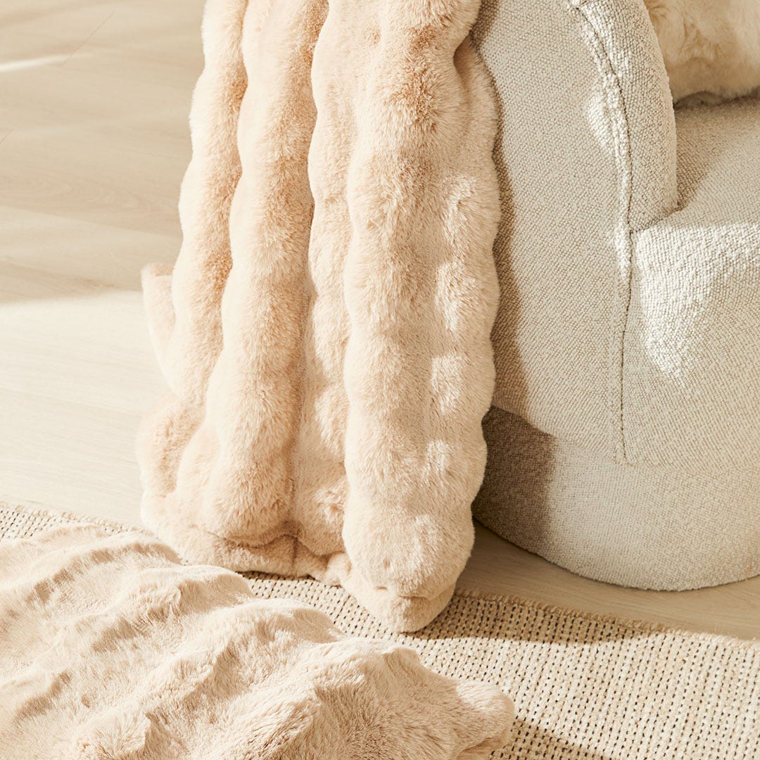 https://s3-ap-southeast-2.amazonaws.com/fusionfactory.commerceconnect.bbnt.production/pim_media/000/161/321/M_F_W24_LS_Throw_Cushion_Blanket_Faux_Fur_Malmo_Pumice_SI.jpg?1709166694