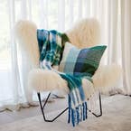 https://s3-ap-southeast-2.amazonaws.com/fusionfactory.commerceconnect.bbnt.production/pim_media/000/163/218/M_F_W24_LS_Throw_Cushion_Blanket_Juni_Check_Green_SI.jpg?1714451043