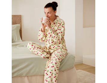 https://s3-ap-southeast-2.amazonaws.com/fusionfactory.commerceconnect.bbnt.production/pim_media/000/189/907/M_F_W25_Studio_LS_Flannelette_Shot_43_Sweet_Cherry_PJs_20_SI.jpg?1740118599